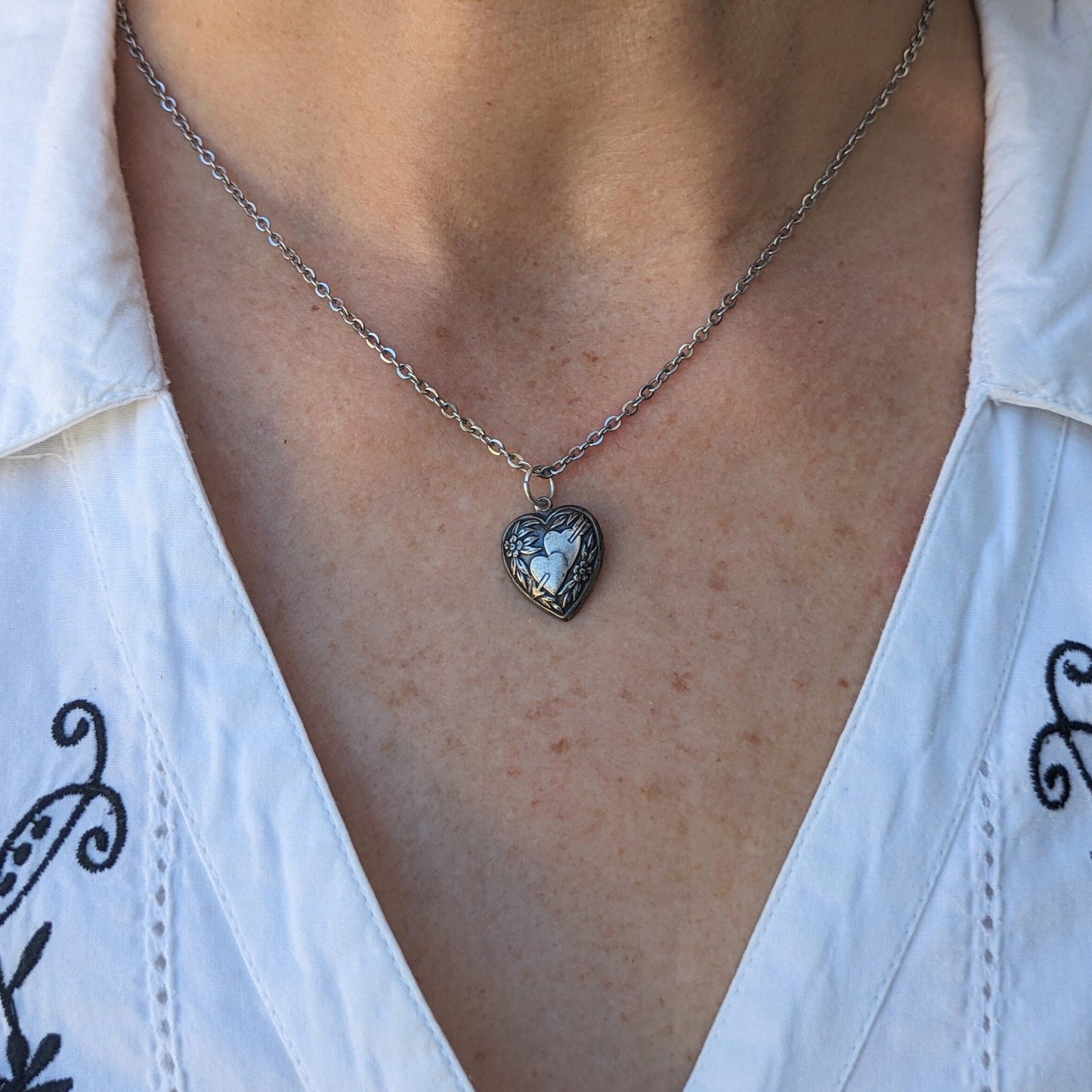 Vintage Heart Pendant Necklace | arrow through two hearts