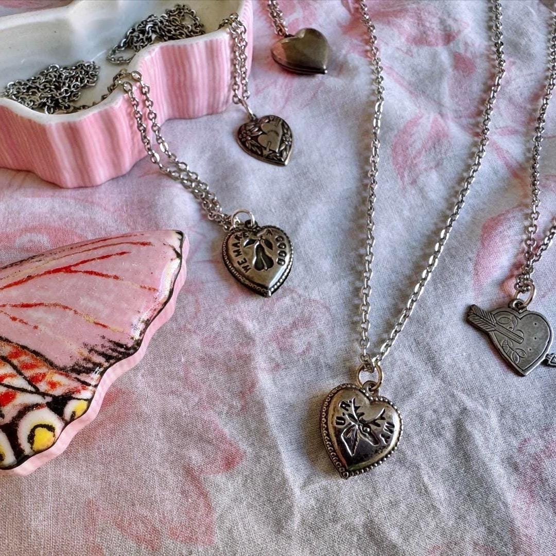 Vintage Heart Pendant Necklace | arrow through two hearts