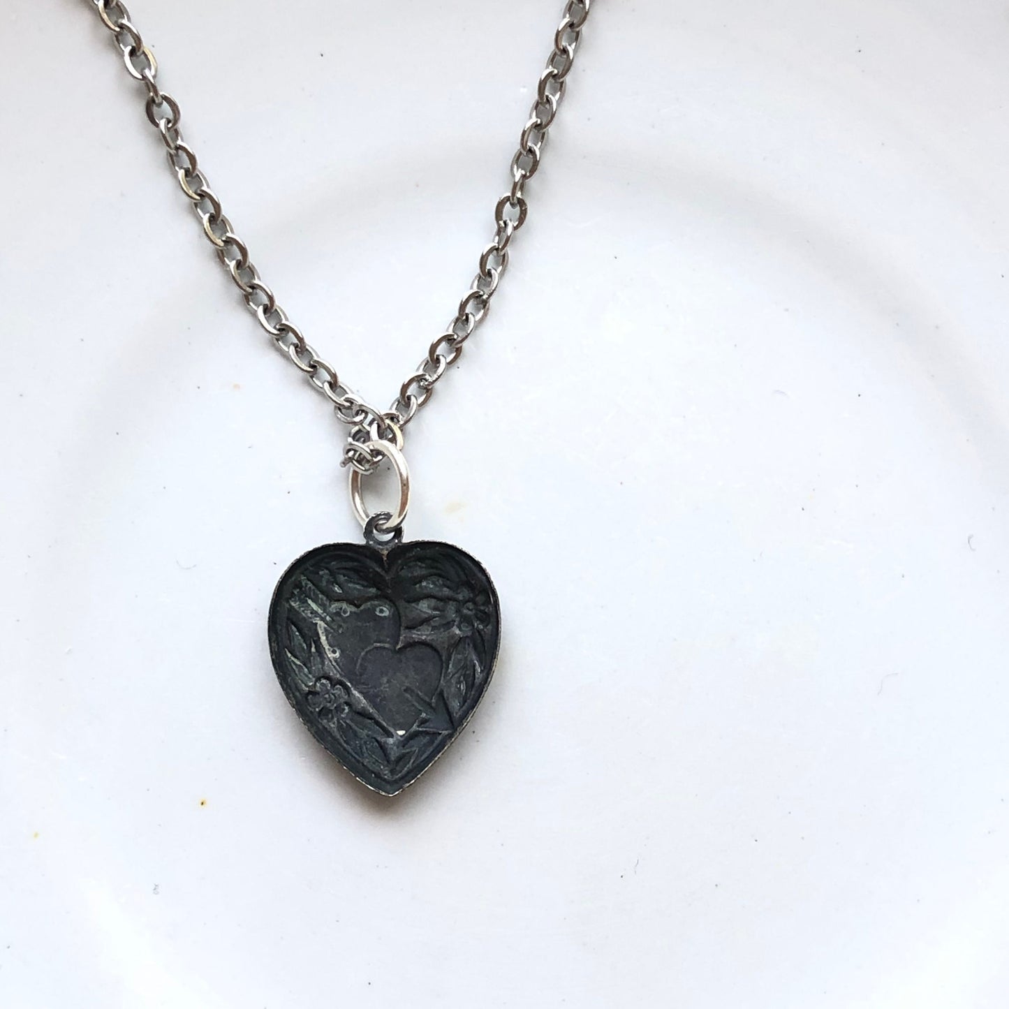 Vintage Heart Pendant Necklace | arrow through two hearts
