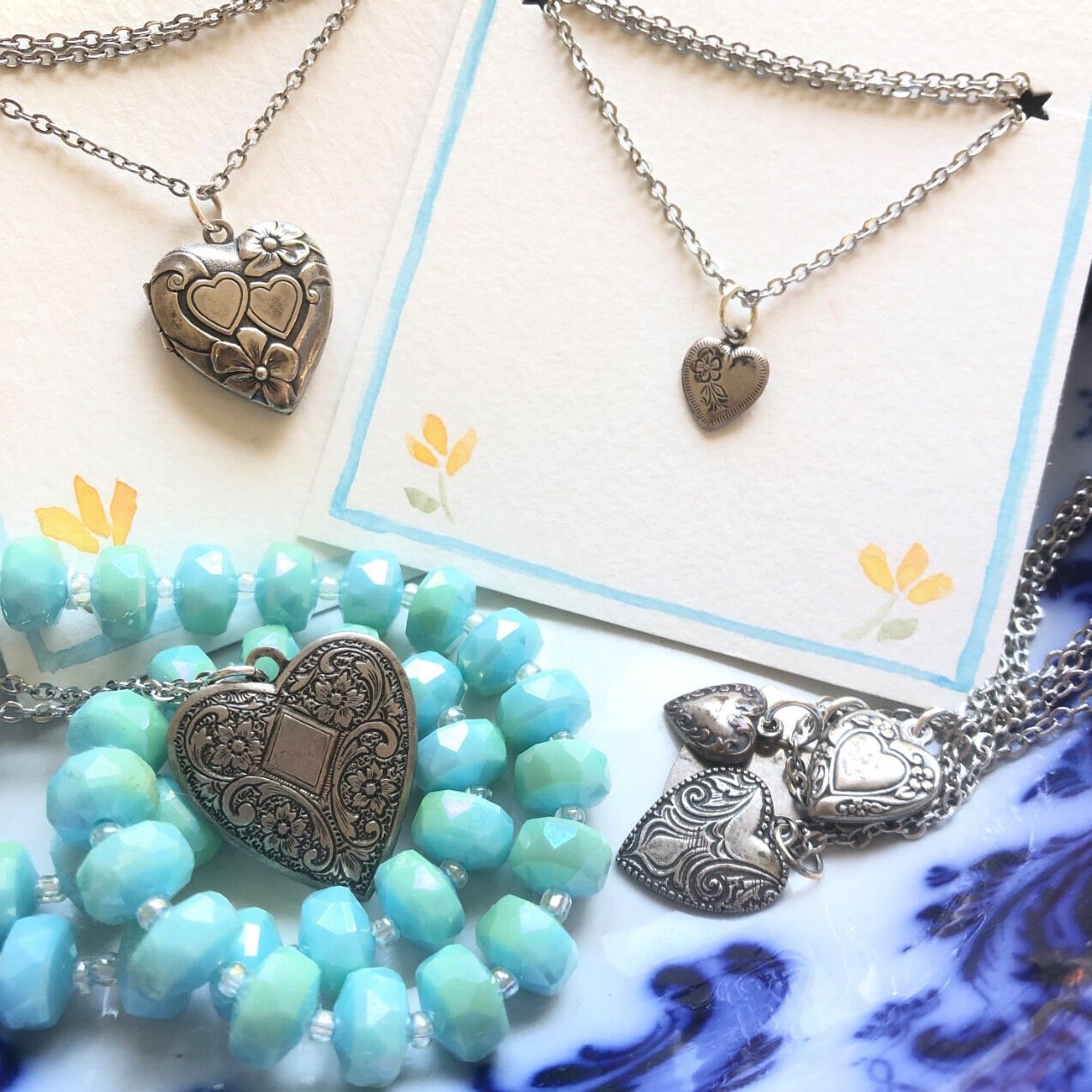 Vintage Heart Pendant Necklace | arrow through two hearts